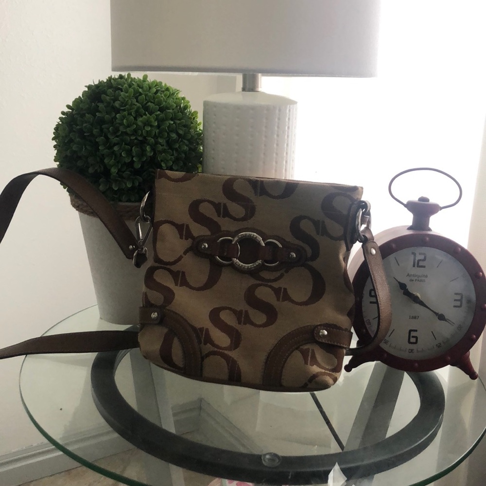 Sophia Caperelli cross body purse.